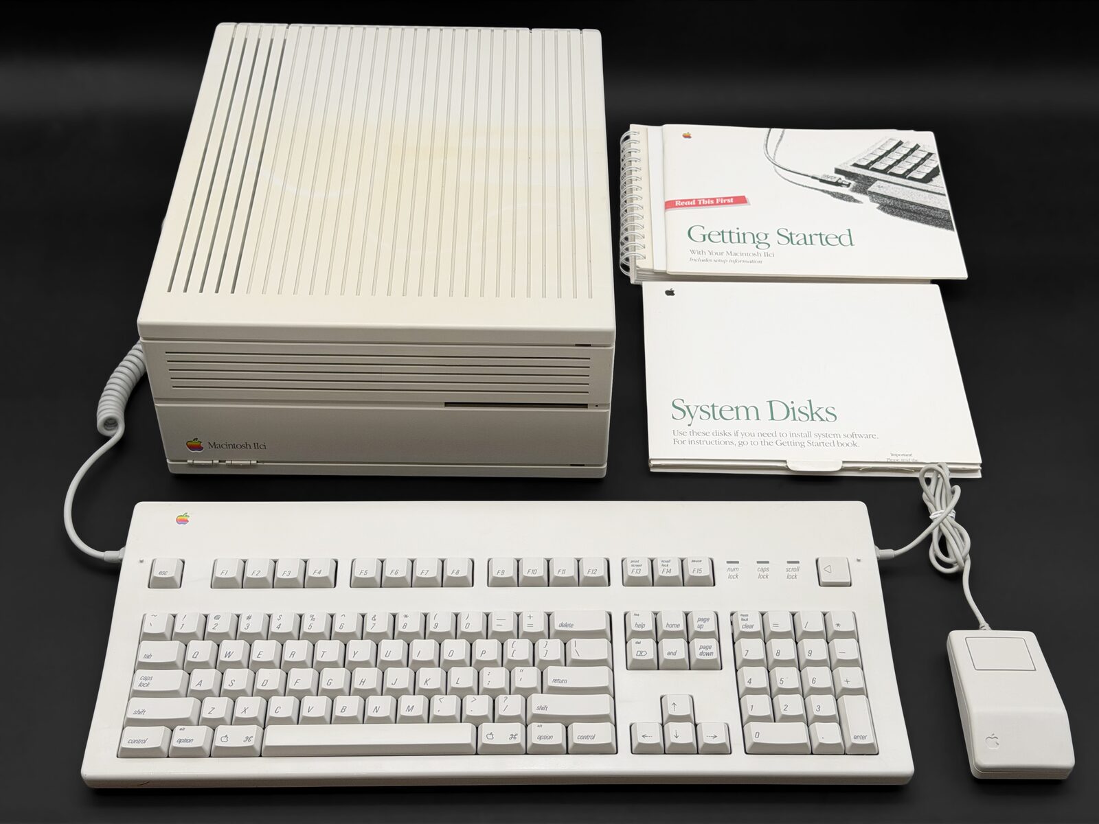 Macintosh IIci with Apple Extended Keyboard, mouse and original manuals and system disks